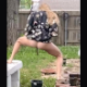 A blonde woman is recorded straddling a bucket while taking a long, smooth shit. Presented in 720P vertical HD format. Brief video clip at 12 seconds.